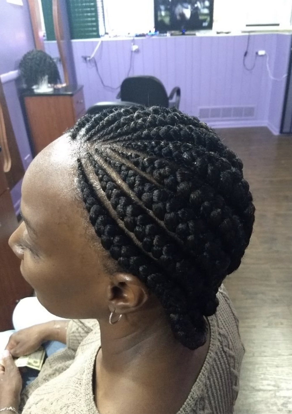 Black stitched cornrow updo